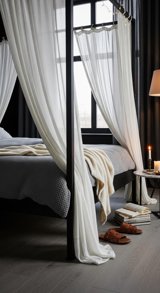 Black Canopy Bed Frame with Sheer White Curtains